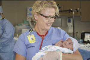 cna resume- nurse with baby