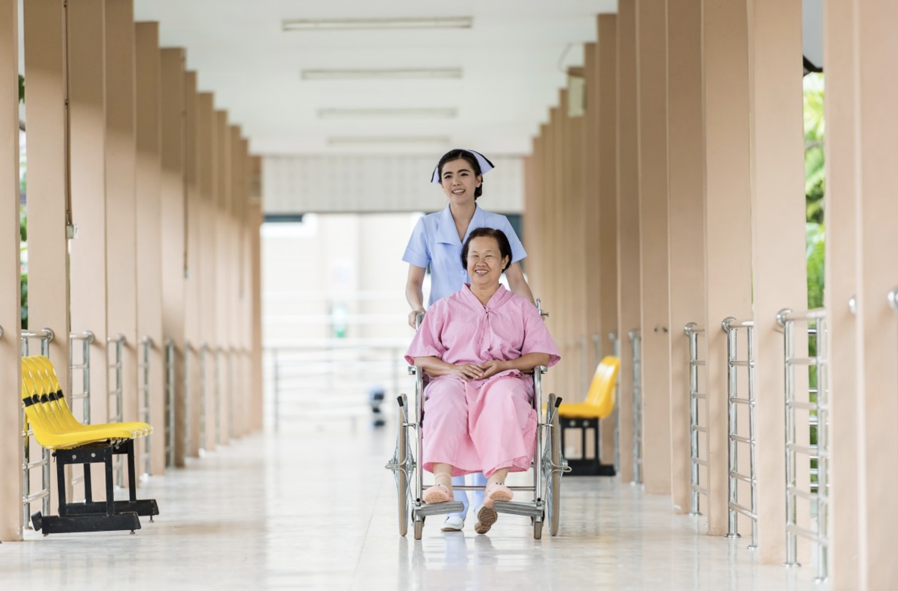 caregiver duties-Nurse taking care of a patient in wheelchair