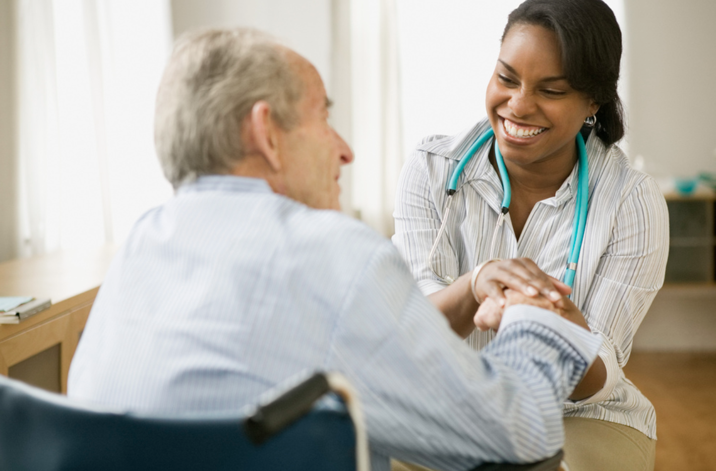 caregiver duties-nurse checking with a patient